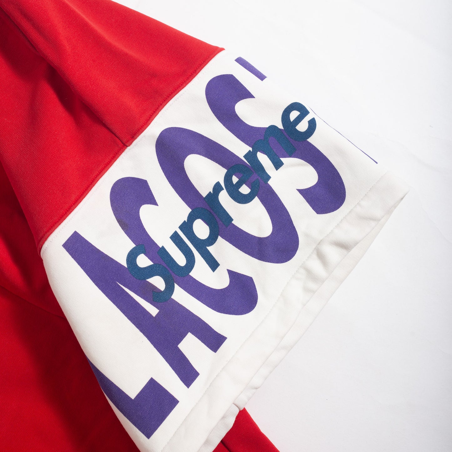 Bermuda Lacoste x Supreme Vermelha (VNDS)