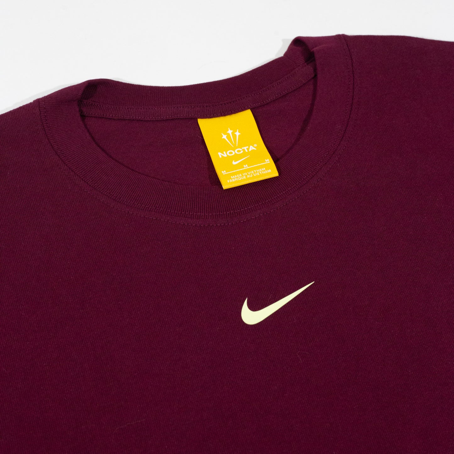 Camiseta Nike x Nocta CS Dark Beetroot