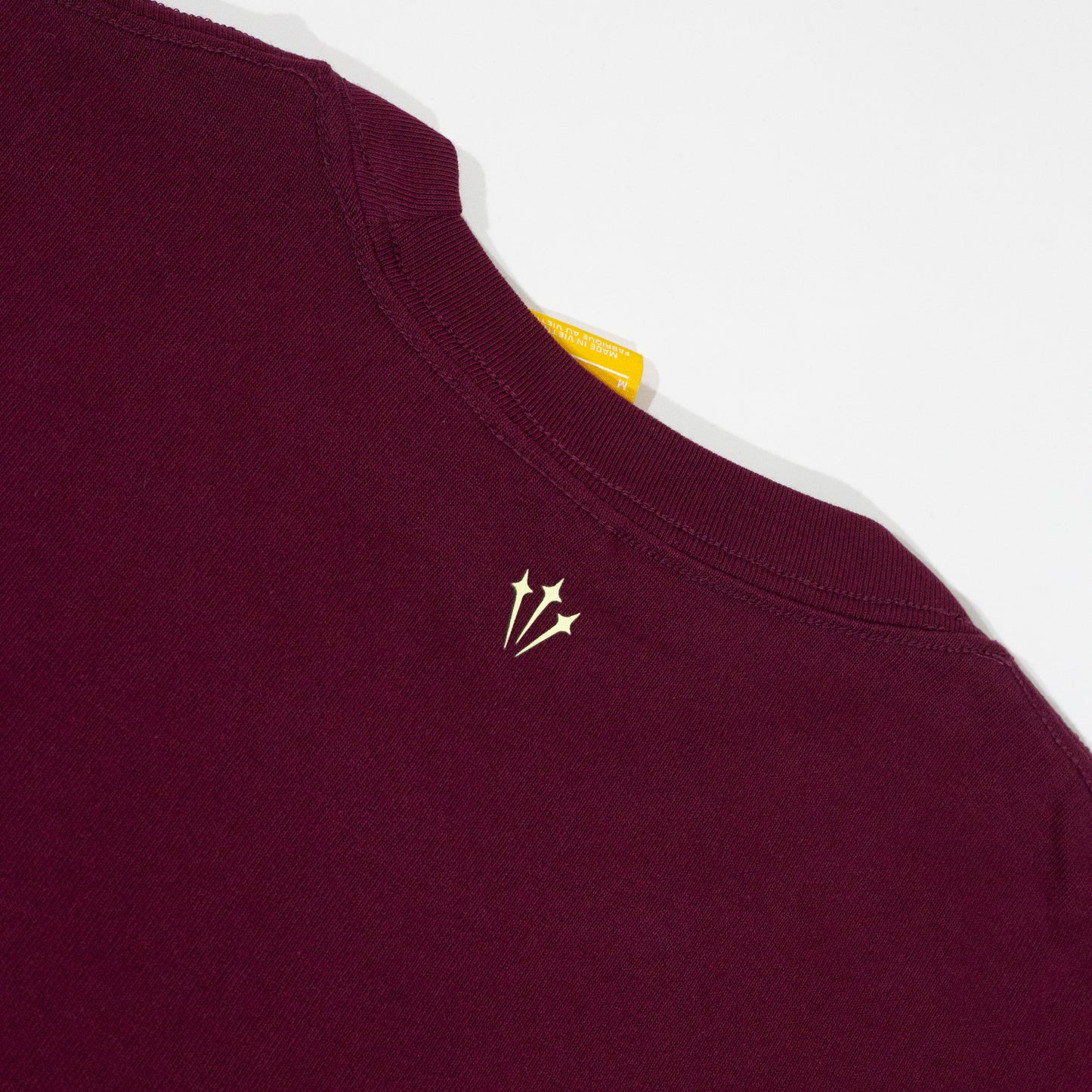 Camiseta Nike x Nocta CS Dark Beetroot