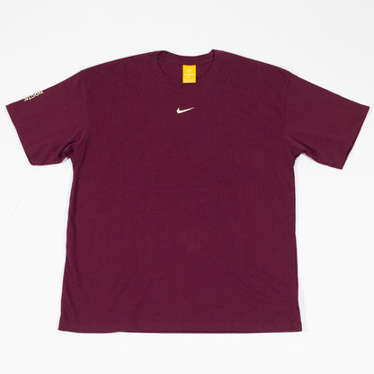 Camiseta Nike x Nocta CS Dark Beetroot