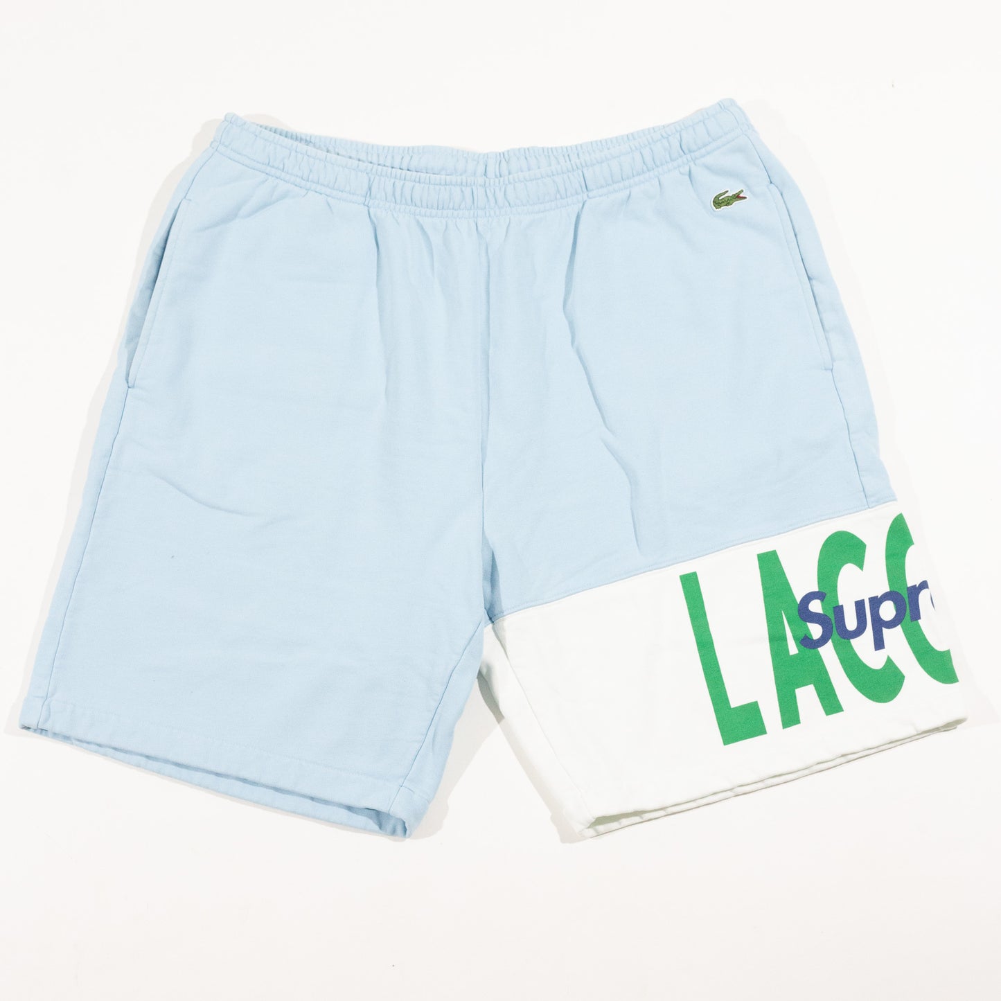 Bermuda Supreme x Lacoste Azul Bebe FW19