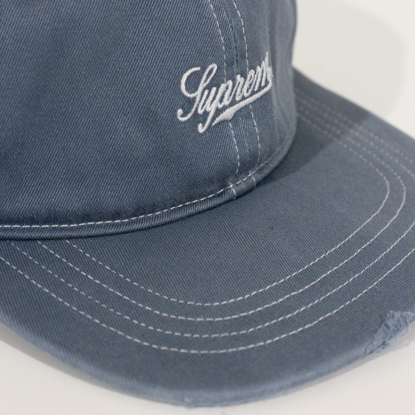 Bone Supreme Distressed Script 6 Panel Azul