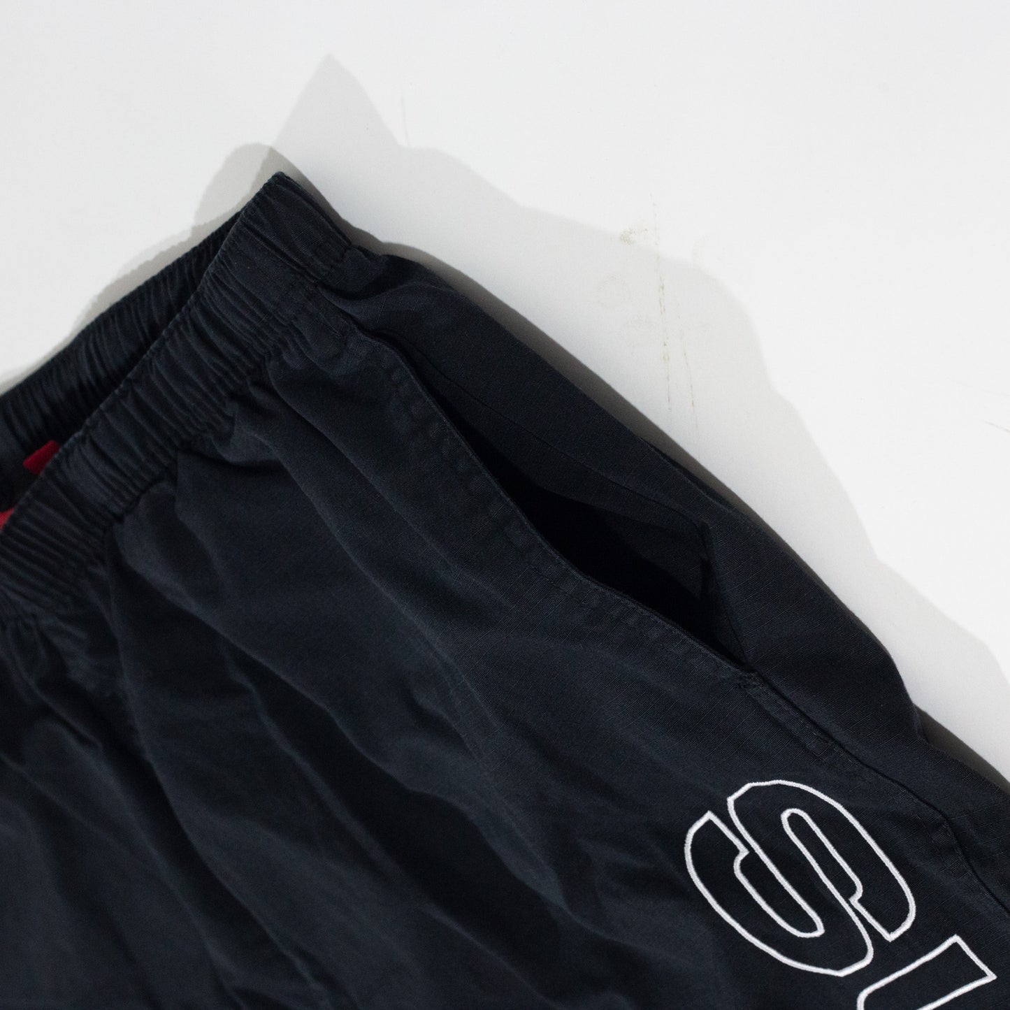 Calça Supreme Spellout Embroidered