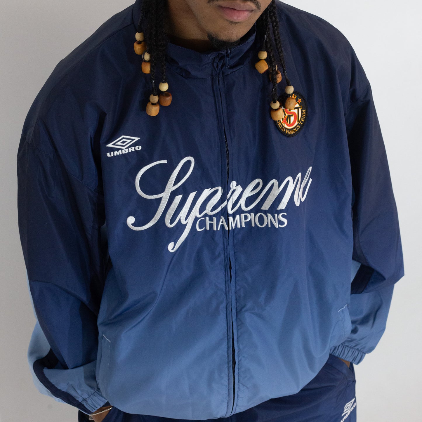 Jaqueta Supreme x Umbro Track Gradient Azul