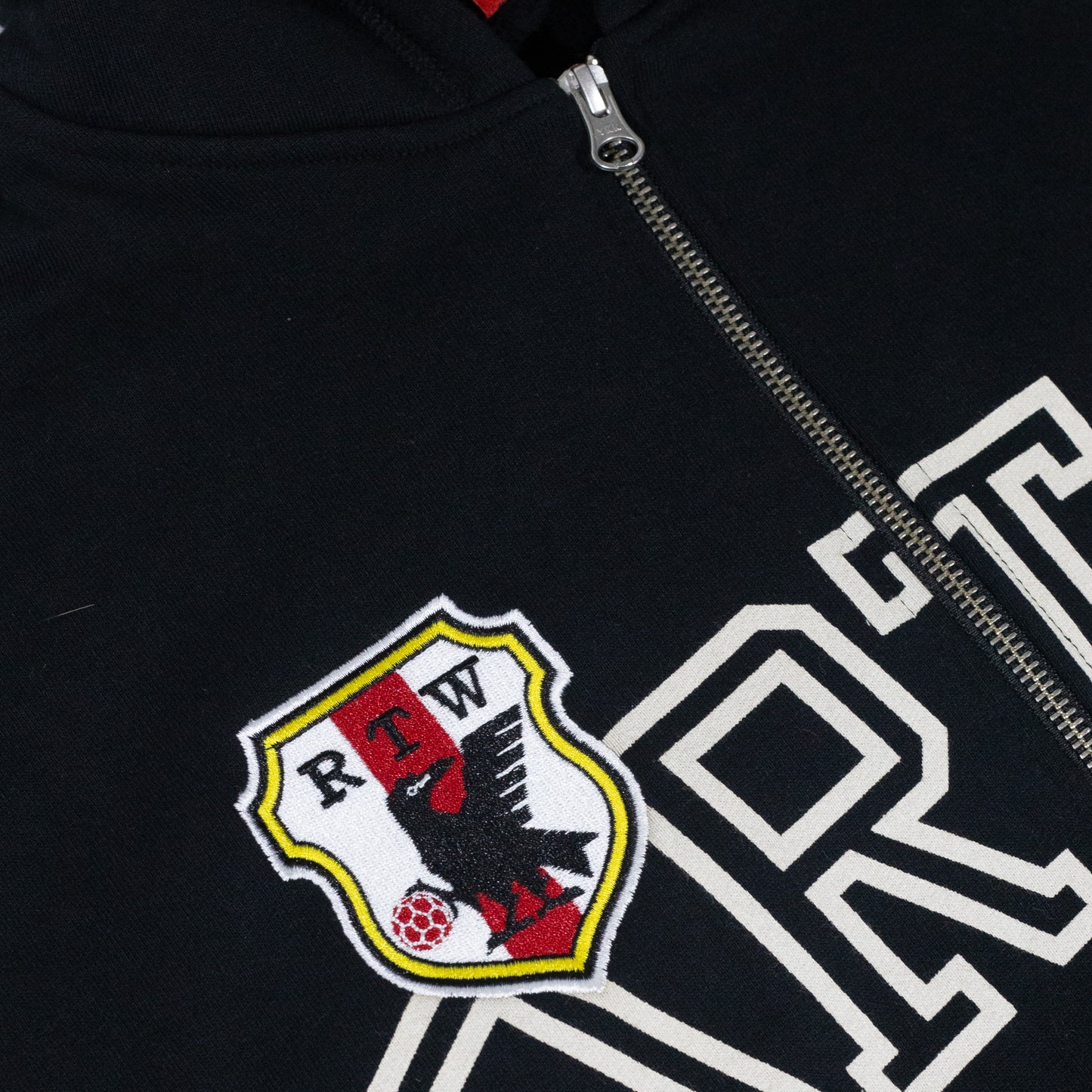 Jaqueta Corteiz Arch Shield