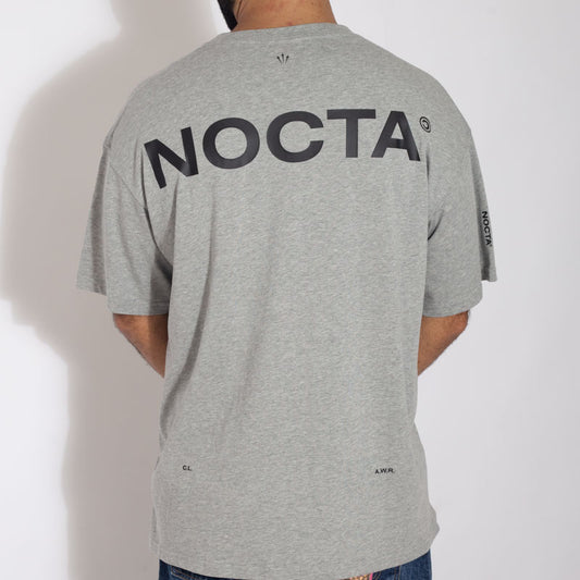 Camiseta Nike x Nocta Cinza