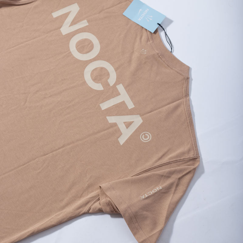 Camiseta Nike x Nocta Bege